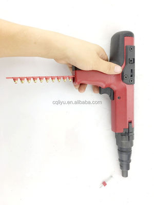 Red Upholstery Decorative Nail Gun with Strip Powder Loads and Durable Concrete Nails